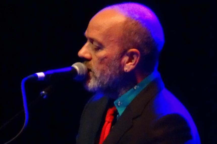 R.E.M. frontman Michael Stipe performs at Webster Hall in New York. The pioneering alternative rock singer took to the stage as a surprise opening act for punk icon Patti Smith. &nbsp;-- PHOTO: AFP