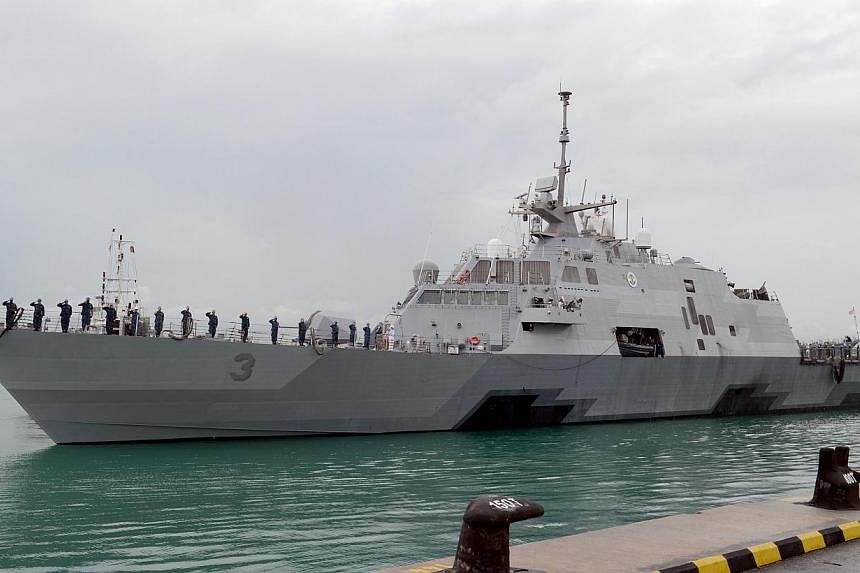 The littoral combat ship USS&nbsp;Fort Worth arrives in Singapore, on a 16-month&nbsp;deployment to 7th Fleet in support of the Asia-Pacific rebalance.&nbsp;The US Navy plans to send a second ship to help search for wreckage from an AirAsia jet that 