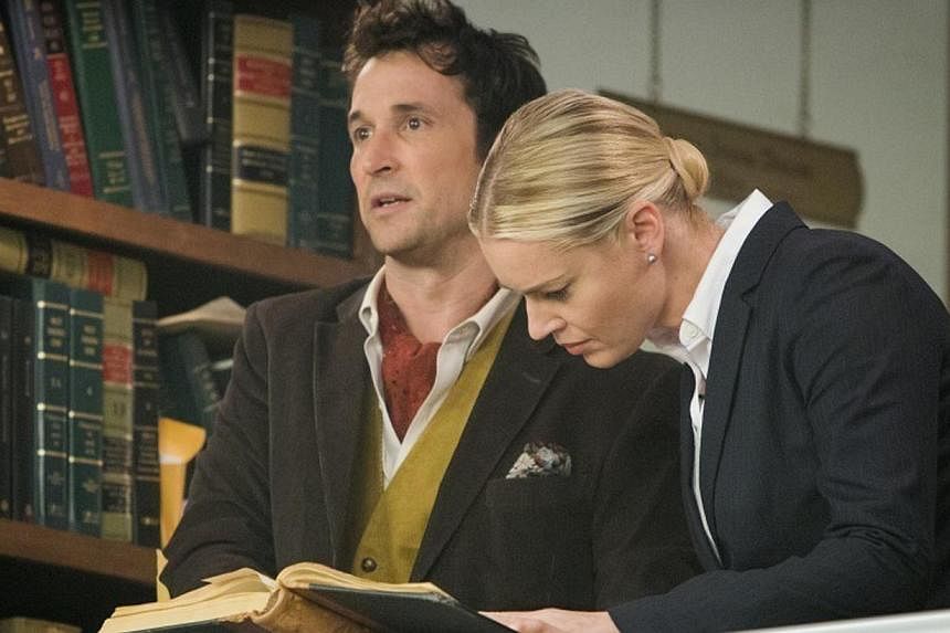 The Librarians stars Noah Wyle and Rebecca Romijn (both above). -- PHOTO: UNIVERSAL CHANNEL