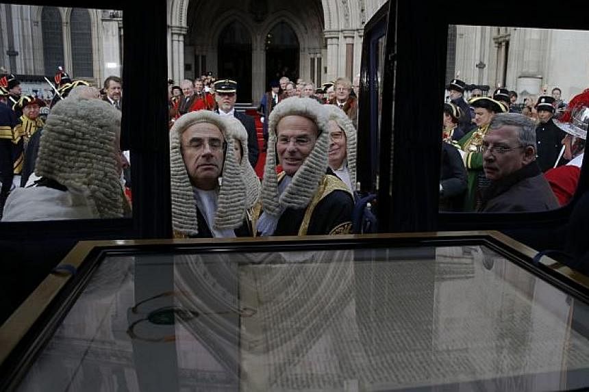 Judges looking at the City of London's 1297 Magna Carta in a carriage during the Lord Mayor's show in London on Nov 8, 2014.&nbsp;English Heritage, the official government cultural agency, has listed the signing of the famous Magna Carta, or Great Ch