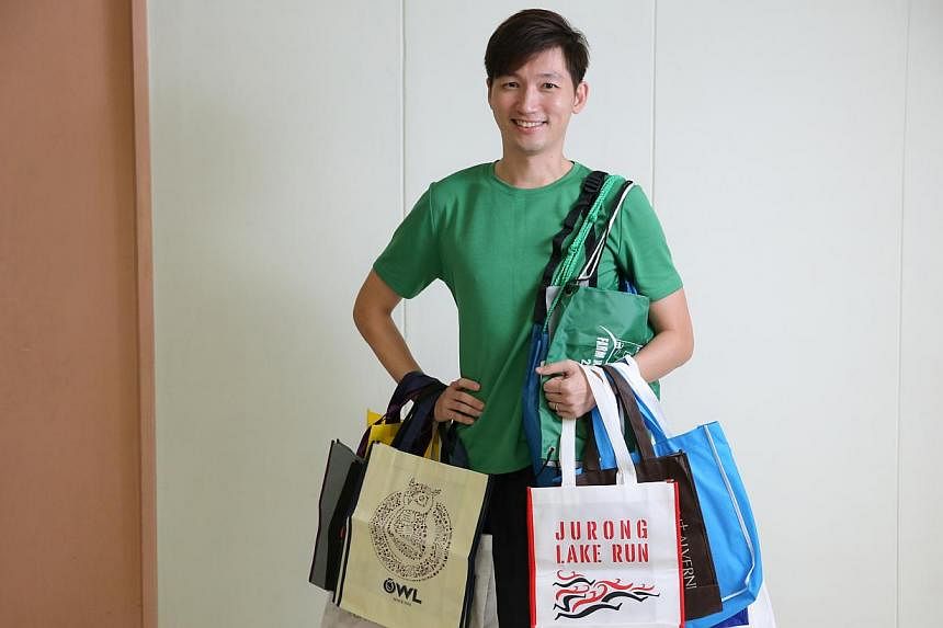 Mr Darren Ang has a small collection of reuseable bags which he tries to use when out shopping.