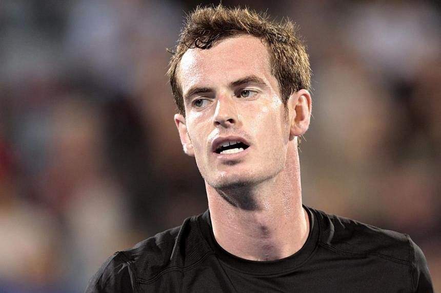 Andy Murray of Britain reacts during his opening match against Feliciano Lopez of Spain at the Mubadala World Tennis Championship in Abu Dhabi Jan 1, 2015. -- PHOTO: REUTERS
