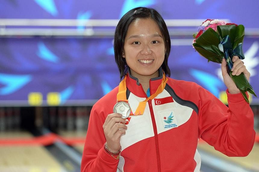 Bowler Jazreel Tan wins a silver medal in the 17th Asian Games Incheon 2014 women's singles bowling event held at the Anyang Hogye Gymnasium in Incheon, South Korea, on Sept 24, 2014. The&nbsp;Singaporen bowler has started 2015 on a roll by being cro