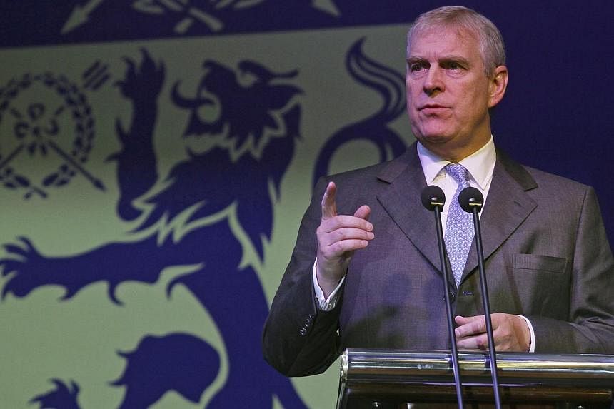 Britain's Prince Andrew speaks at the 10th anniversary of Harrow International School Beijing, on Oct 24, 2014. The woman who named Prince Andrew in a US court filing claiming that she was kept as an underage "sex slave" by a Wall Street financier sa
