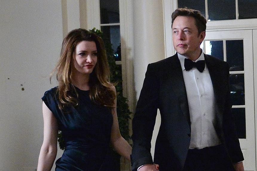 Mr Elon Musk and Ms Talulah Riley arriving at the White House in Washington in this Feb 11, 2014, file photo. The Internet entrepreneur and his British actress wife agreed to "amicably" end their marriage, according to a statement received on Friday.