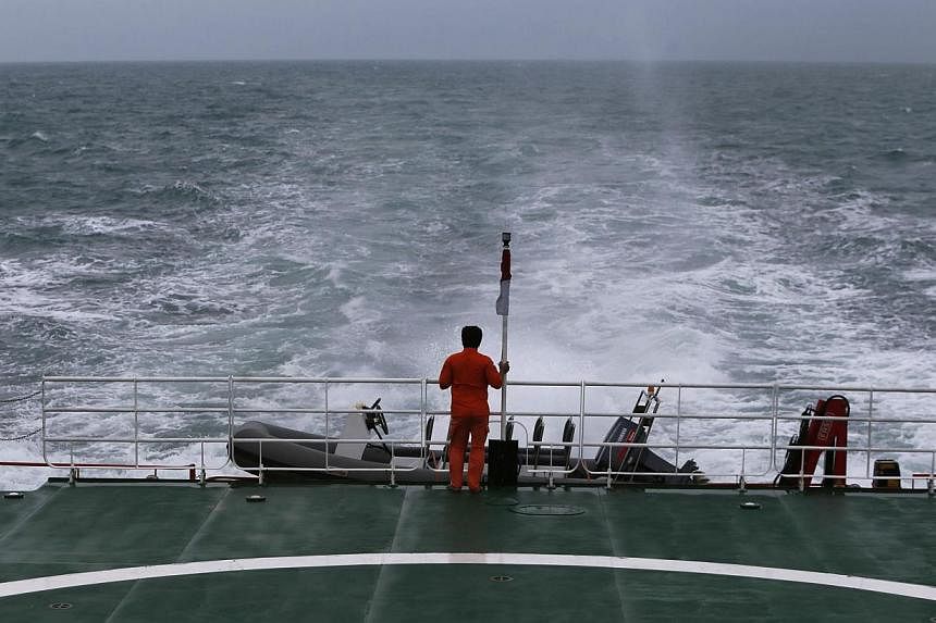 The SAR ship KN Purworejo on a search operation for passengers onboard AirAsia flight QZ8501 in the Java Sea on Jan 3, 2015. -- PHOTO: REUTERS
