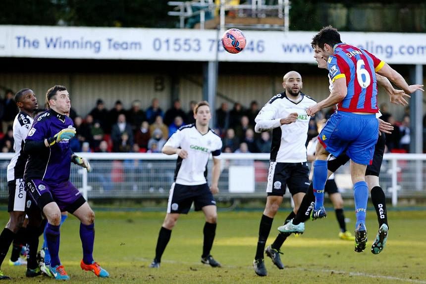 Crystal Palace's Scott Dann (right) scores his side's second goal against Dover Athletic in the FA Cup third round.&nbsp;-- PHOTO:&nbsp;ACTION IMAGES