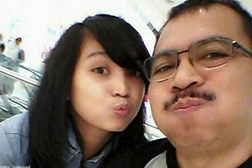 Angela Anggi Ranastianis, 22, the daughter of Captain Iriyanto, pilot of the crashed AirAsia Indonesia flight QZ8501, has made a televised plea to the public not to blame her father. -- PHOTO: INTERNET
