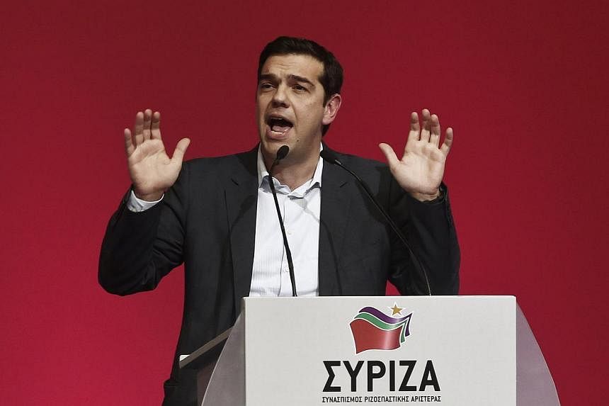 Alexis Tsipras, opposition leader and head of radical leftist Syriza party, delivers a speech during a party congress in Athens Jan 3, 2015.&nbsp;According to a report, the German government considers a Greece exit almost unavoidable if the Syriza pa