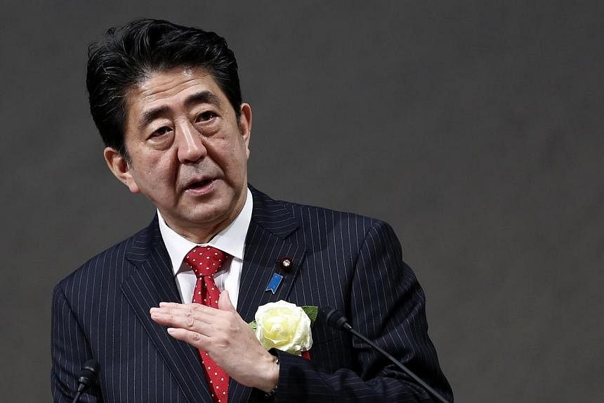 Japan's conservative Prime Minister Shinzo Abe said on Monday, Jan 5, 2015, that he would release a fresh statement on World War II this year, but would stand by previous apologies for wartime misdeeds. -- PHOTO: REUTERS