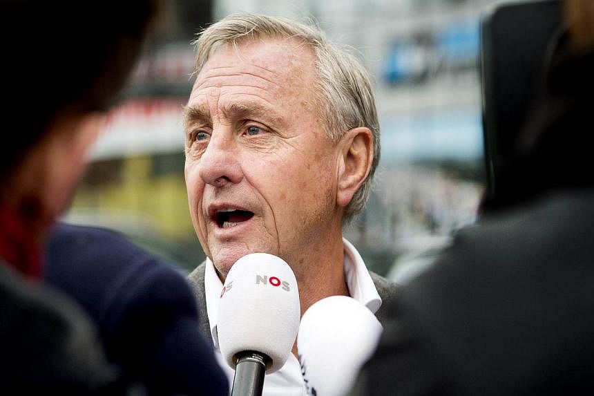 Former Netherlands great Johan Cruyff has told Manchester United manager Louis van Gaal he has no right to complain about the hectic holiday-season football programme in the Premier League when he chose to go and work there. -- PHOTO: AFP