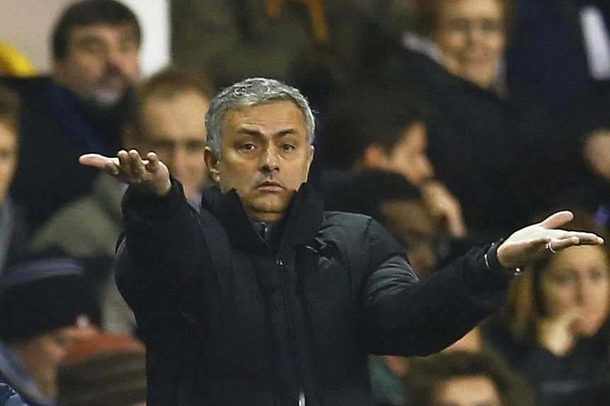 Chelsea manager Jose Mourinho has apologised for criticising referee Kevin Friend in the aftermath of his side's 3-0 win over Watford in the FA Cup at the weekend. -- PHOTO: REUTERS