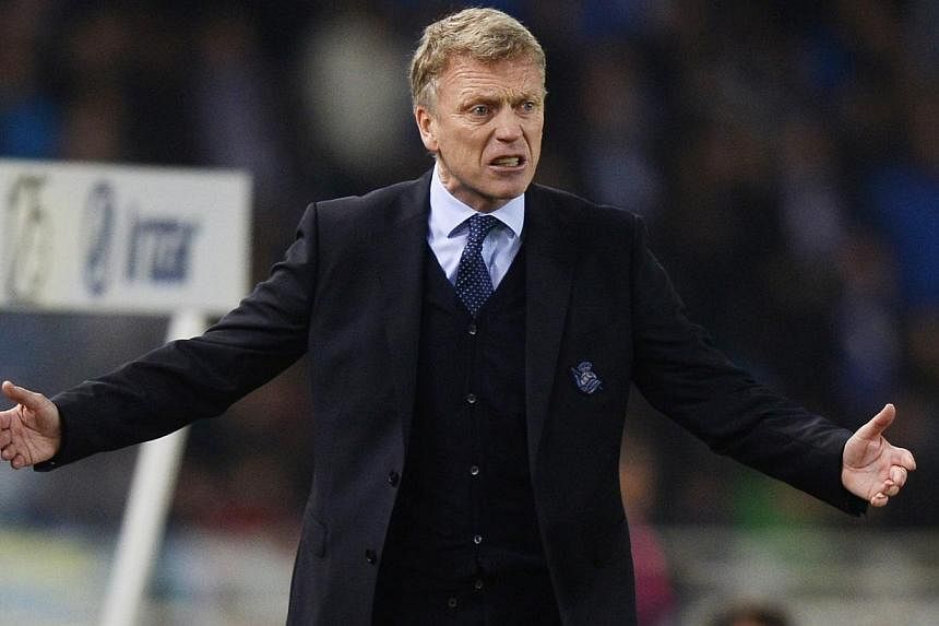 David Moyes on the sidelines of the clash with Barcelona. -- PHOTO: REUTERS