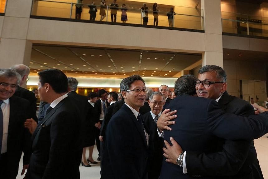 Chief Justice Sundaresh Menon (right) at the opening of the new legal year.&nbsp;-- ST PHOTO: NEO XIAOBIN