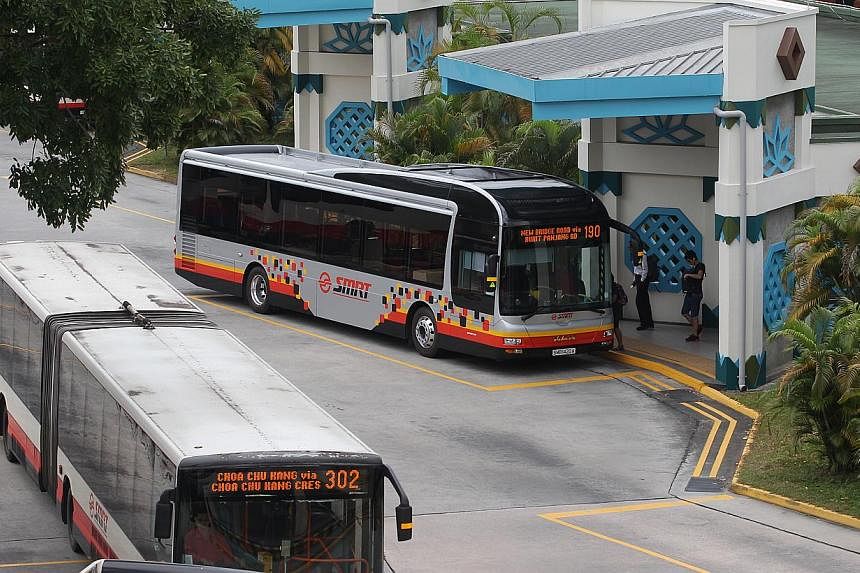 Buses at Choa Chu Kang bus interchange. -- ST PHOTO: ONG WEE JIN