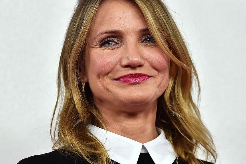 US actress Cameron Diaz posing during a photo call for the film Annie in London on Dec 16, 2014. Diaz and rocker Benji Madden married on Monday night after dating for seven months, People magazine reported. -- PHOTO: AFP