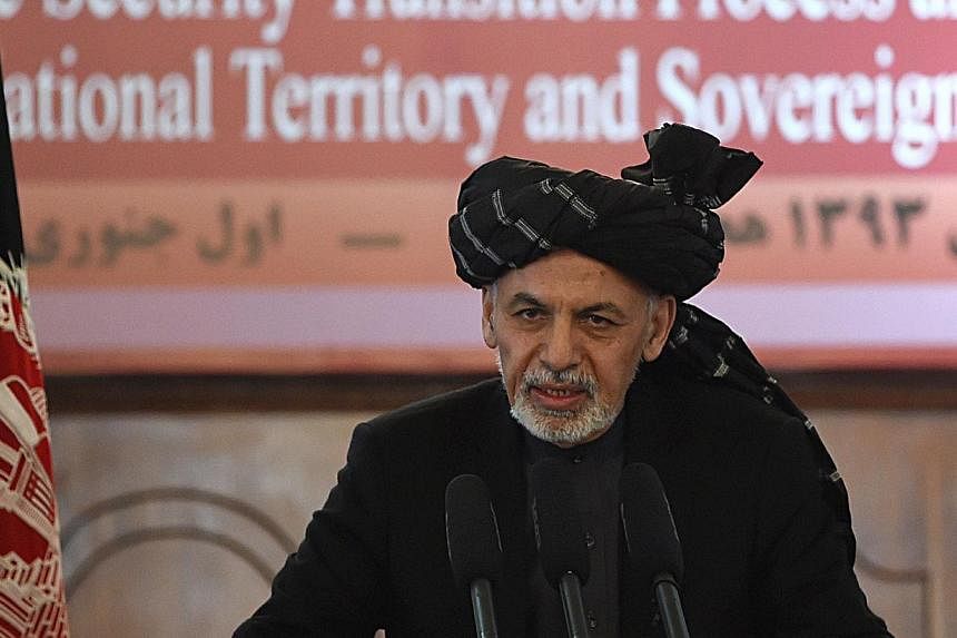 Afghan President Ashraf Ghani addresses an event at the Presidential palace in Kabul on Jan 1, 2015.&nbsp;-- PHOTO: AFP