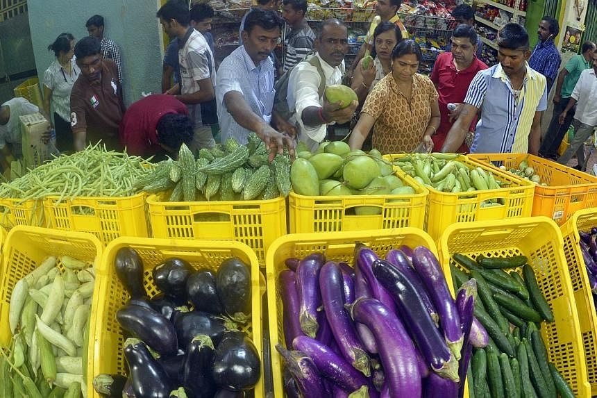 Malaysian vegetables such as brinjal and cucumber now cost more at wet markets, but the prices at supermarket chains here have so far remained the same despite the fall in supply.