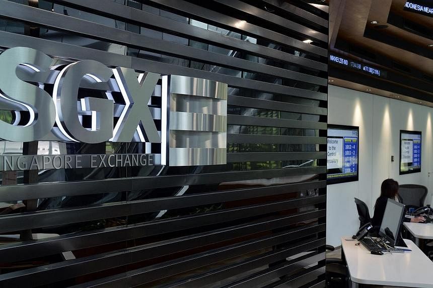 The Singapore Exchange recovered from Tuesday's rout, bucking the pressure from a poor outlook amid the free-falling oil prices and a fresh crisis in the Eurozone. -- PHOTO: ST FILE