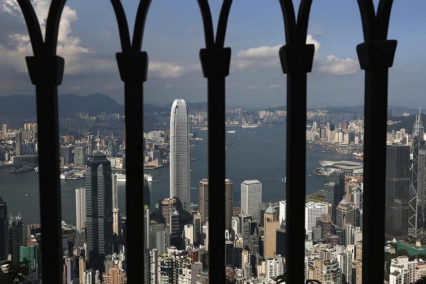 Hong Kong's home prices hit a record high for a seventh consecutive month in November as pent-up demand for smaller units continued to boost sales. -- PHOTO:REUTERS