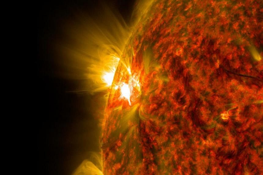 An active region on the sun as it emitted a mid-level solar flare in a handout image by NASA obtained on Nov 6, 2014. In an unusual study, Norwegian scientists said people born during periods of solar calm may live longer than those who enter the wor