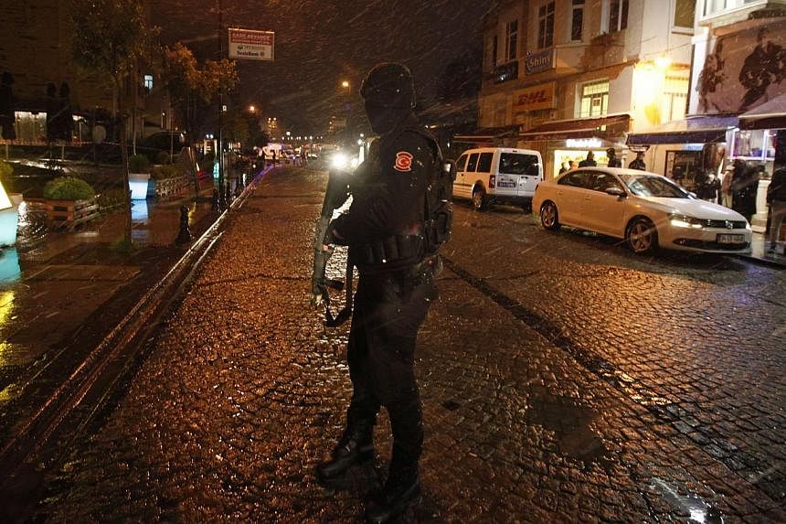 A police officer stands guard at the scene of a bomb blast in Istanbul Jan 6, 2015.&nbsp;An outlawed Turkish Marxist group on Wednesday claimed a strike by a female suicide bomber in the heart of Istanbul's tourist district, raising fears of a wave o