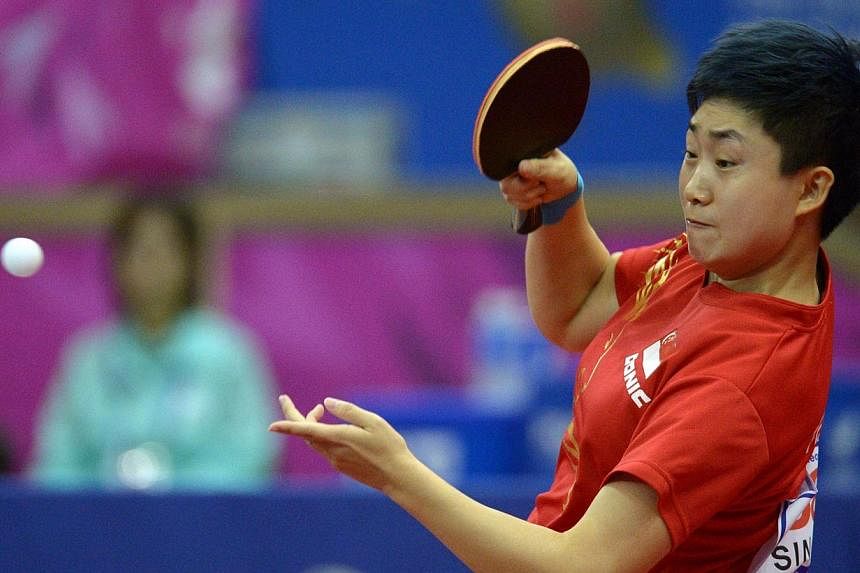 Singapore's&nbsp;Feng Tianwei and Co. opened their campaign at the International Table Tennis Federation World Team Cup in Dubai with a clinical 3-0 victory over hosts United Arab Emirates (UAE) on Thursday. -- PHOTO: ST FILE