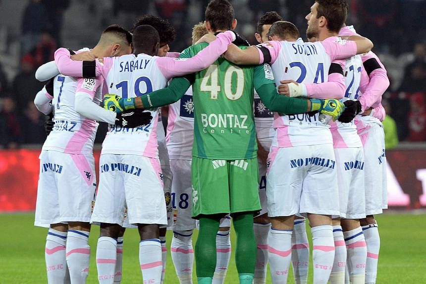 A minute's silence will be observed at football grounds throughout France this weekend as a mark of respect for the 12 people killed in the terrorist attack on the Charlie Hebdo satirical newspaper, the French Football Federation (FFF) announced on T