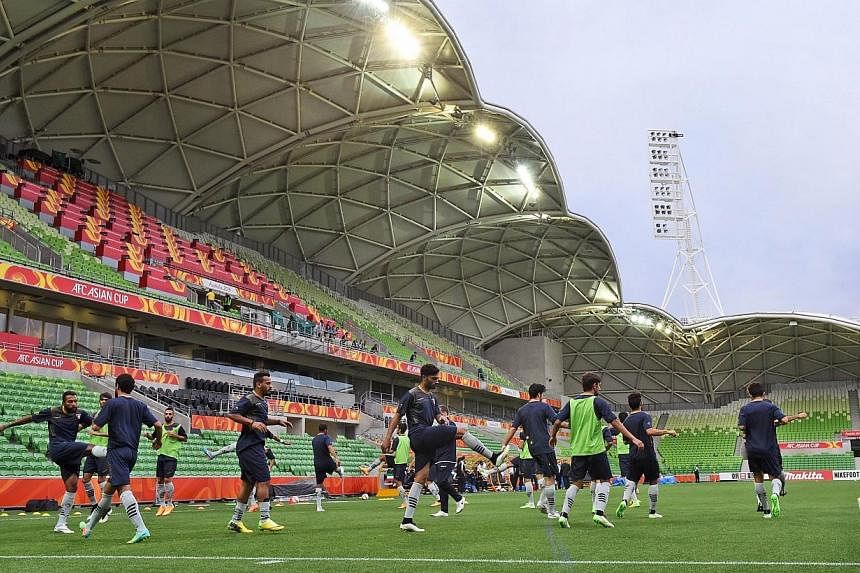 Kuwait's football team go through their exercises in the final training session ahead of the Asian Cup in Melbourne on Jan 8, 2015. Australia and Kuwait play the opening match of the AFC Asian Cup on Jan 9, 2015. -- PHOTO: AFP