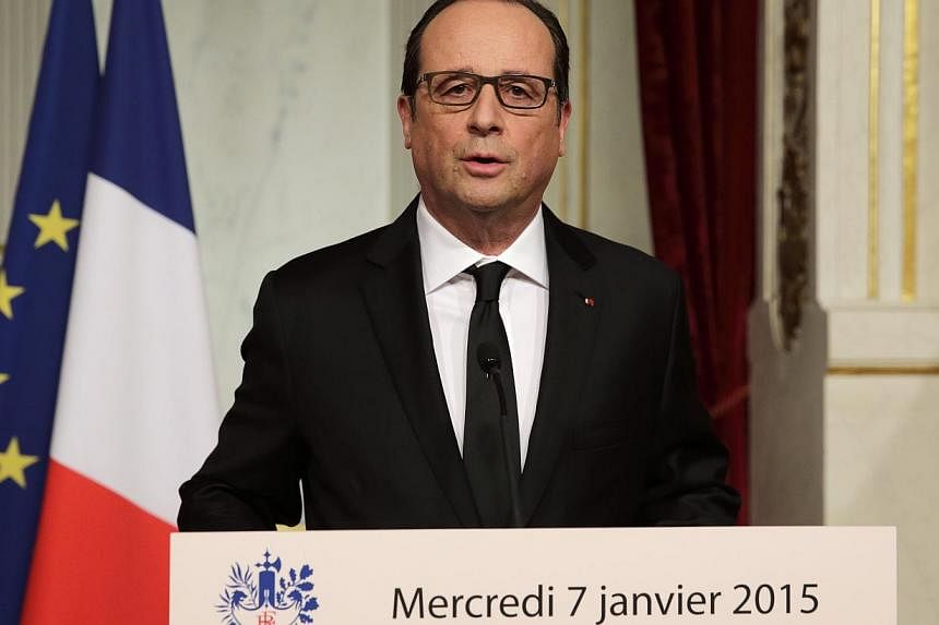 French President Francois Hollande delivers a speech at the Elysee Palace after a shooting at the Paris headquarters of satirical weekly Charlie Hebdo killing at least 12 people and injuring many, Jan 7, 2015. -- PHOTO: REUTERS