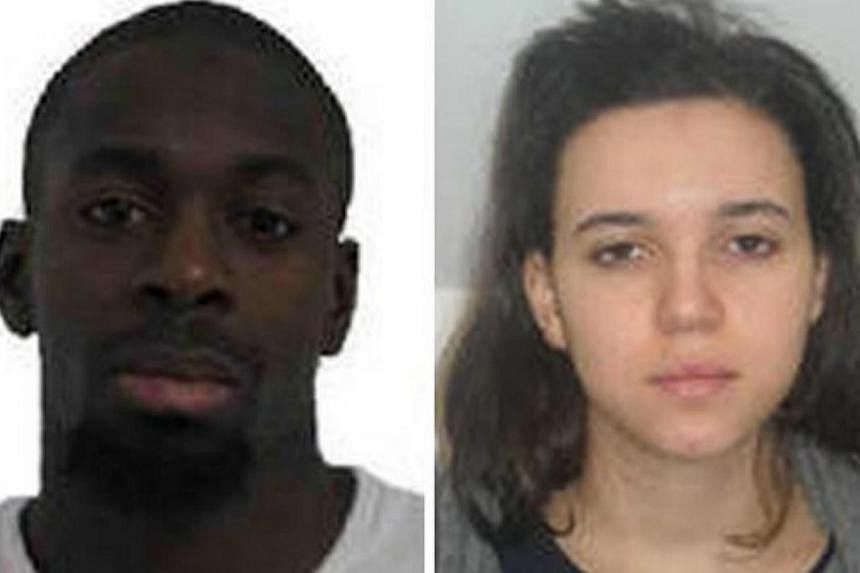 A composite image of two handout pictures released by French Police in Paris on Jan 9, 2015, shows Amedy Coulibaly (left) and Hayat Boumeddiene, suspects in connection with the shooting attack on Jan 8, 2015, in Montrouge, France. -- PHOTO:&nbsp;EPA/