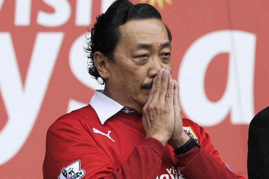 Cardiff City's owner Vincent Tan looks on during their English Premier League soccer match against Crystal Palace at Cardiff City Stadium in Cardiff, Wales on April 5, 2014. -- PHOTO: REUTERS