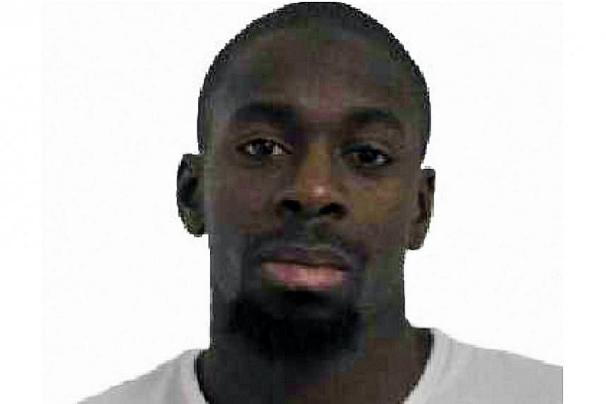 This photo released on Jan 9, 2015, by the French police shows Amedy Coulibaly, suspected of being involved in the killing of a policewoman in Montrouge on Jan 8, 2015. Coulibaly, 32, was seen with Charlie Hebdo suspect Cherif Kouachi in 2010 during 