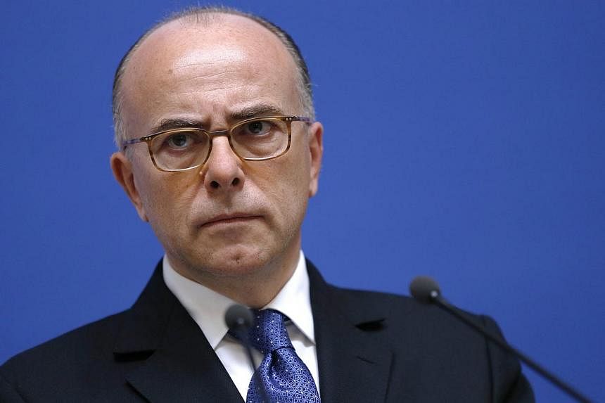 French interior minister Bernard Cazeneuve&nbsp;said he would host an international meeting Sunday for his counterparts from the United States and Europe to discuss the battle against terrorism in the wake of the Paris magazine massacre. -- PHOTO: AF
