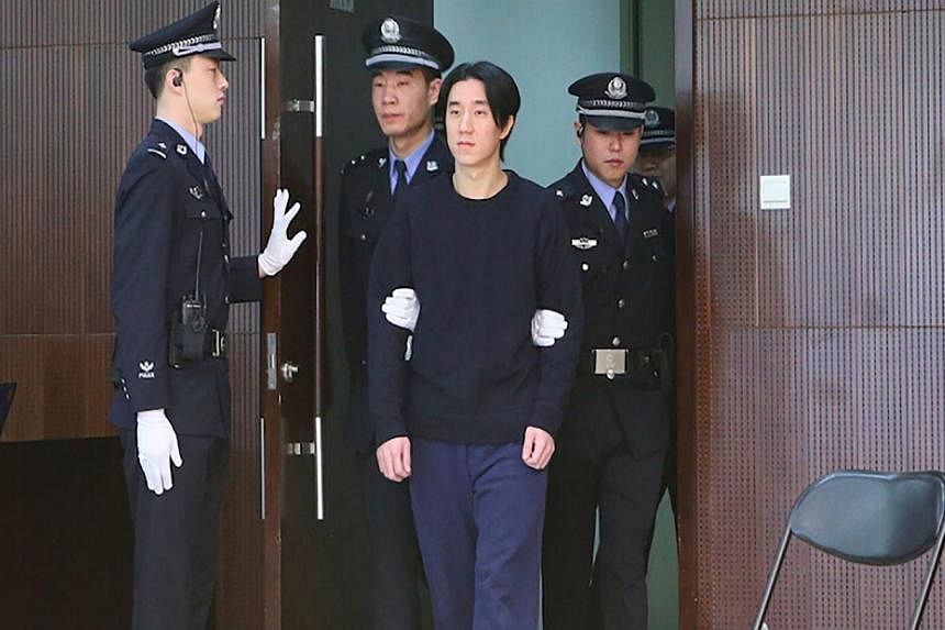 In his first public appearance after his arrest, Jaycee Chan admitted to making his home in Beijing available to drug users, Taiwanese actor Kai Ko and Chinese entertainer Alice Li, four times. -- PHOTO:&nbsp;BEIJING COURT/ WEIBO