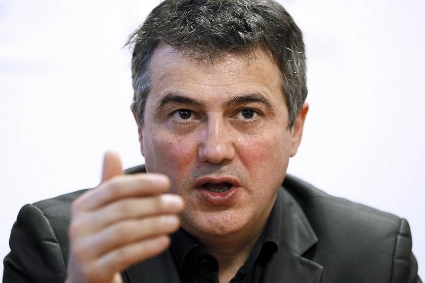 Charlie Hebdo columnist Patrick Pelloux (above)&nbsp;on Thursday described the horrific scene that greeted him after his colleagues were shot dead at the French satirical newspaper's office and said "I couldn't save them". -- PHOTO: AFP