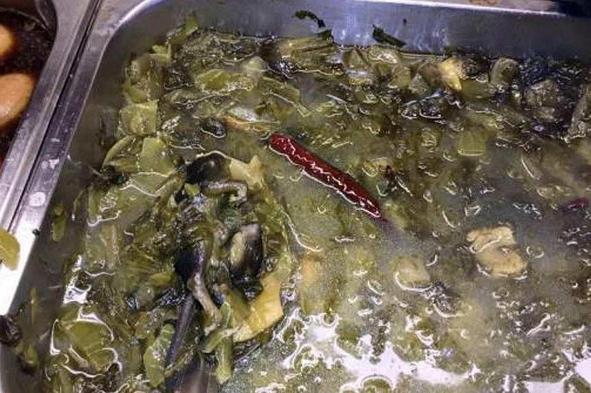 Chinese restaurant Hotpot Culture was suspended by the authorities after pictures of a rat carcass in a dish surfaced online. -- PHOTO: CARON CHAN