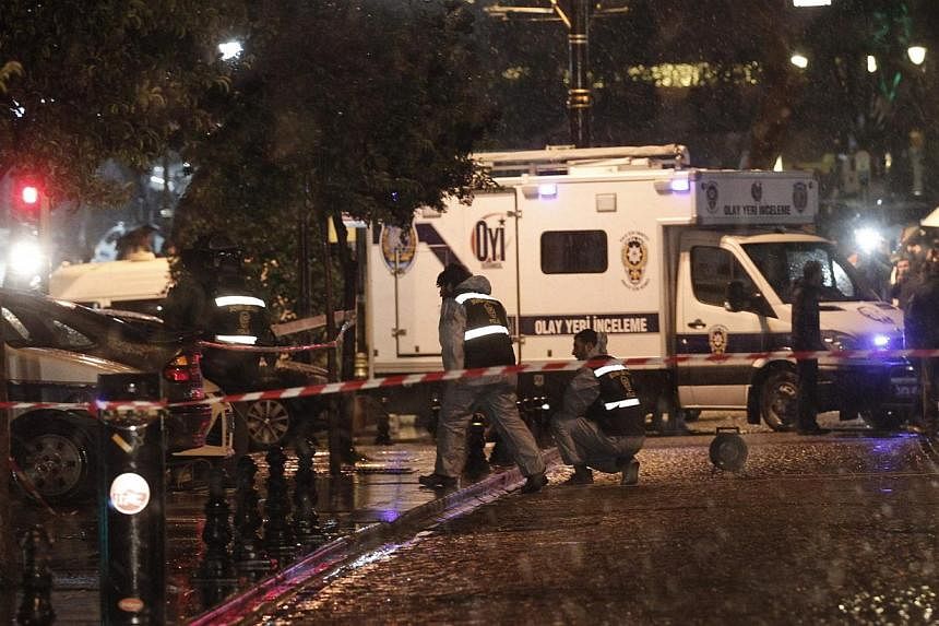 Forensic officers work at the scene of a bomb blast in Istanbul Jan 6, 2015.&nbsp;Uncertainty grew on Thursday over the identity of a female suicide bomber who attacked the heart of Istanbul's tourist district, after reports she was a Russian nationa