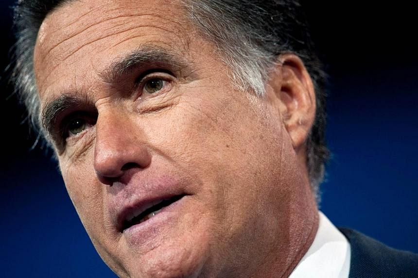 Former Republican Presidential candidate Mitt Romney (above) has said he is mulling another presidential bid.--PHOTO: AFP