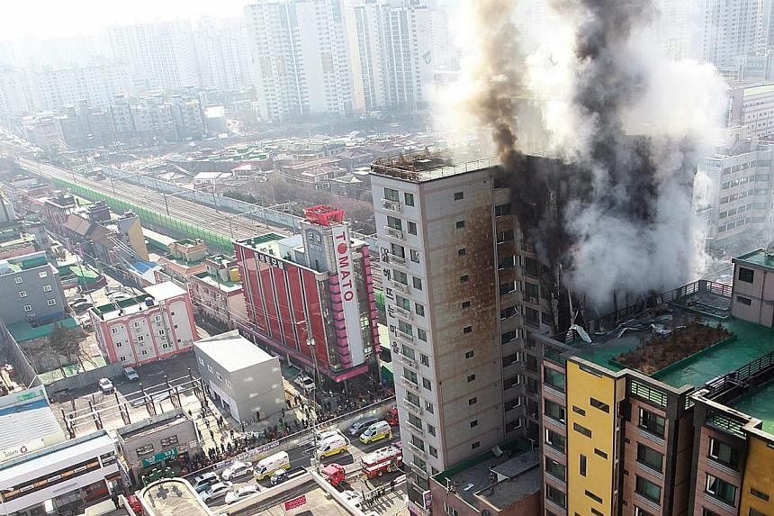 Three people were killed and more than 100 injured in a fire that swept through an apartment building north of Seoul on Saturday, firefighters said.&nbsp;-- PHOTO: EPA&nbsp;