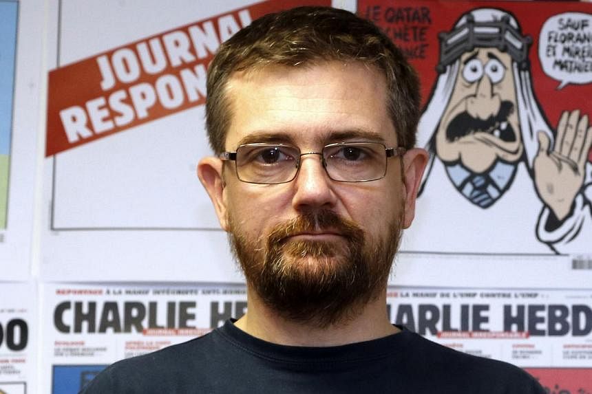 A file photo taken on Dec 27, 2012 in Paris shows Charlie Hebdo's murdered editor Stephane Charbonnier - nicknamed Charb -&nbsp;in the newspaper's offices. -- PHOTO: AFP
