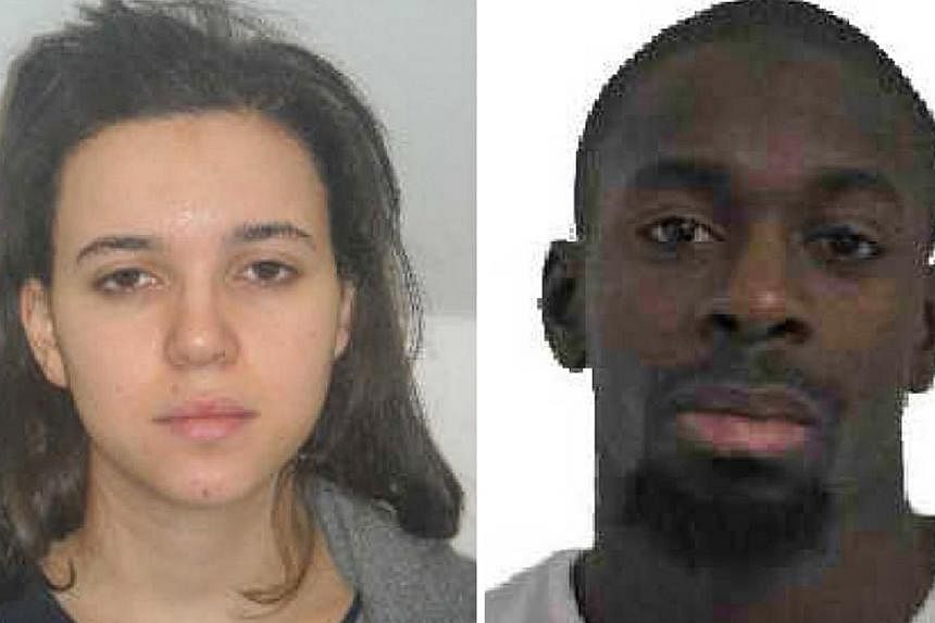 Hayat Boumeddiene (left) and Amedy Coulibaly in a photo released by the Paris Prefecture de Police on Jan 9, 2015. -- PHOTO: REUTERS&nbsp;