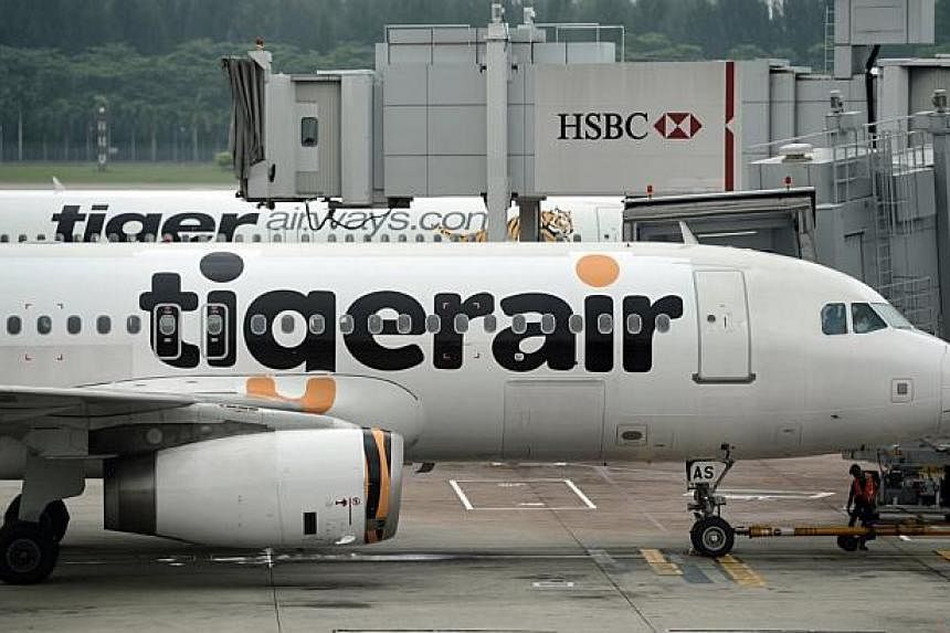 A terminal at Melbourne Airport was evacuated on Friday night after a threat reportedly made against the airline Tigerair. -- PHOTO: ST FILE