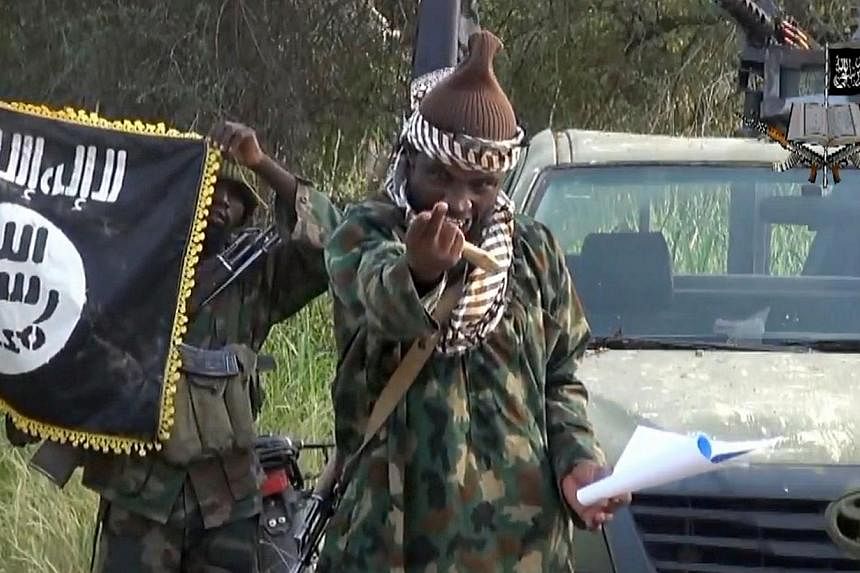 A screengrab taken on Oct 2, 2014, from a video released by the Nigerian Islamist extremist group Boko Haram and obtained by AFP shows the group's leader Abubakar Shekau.&nbsp;Nigerian Boko Haram Islamists launched an attack Monday, Jan 12, 2015, on 