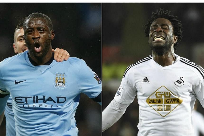 Ivory Coast team-mates and probable future club-mates Yaya Toure (left) and Wilfried Bony headline the departures from the English Premier League for the Africa Cup of Nations -- PHOTO: REUTERS