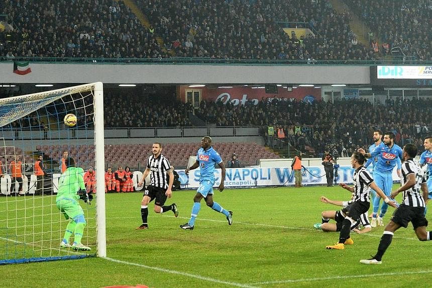 Juventus defender Martin Caceres of Uruguay scores to give his club a 2-1 goal lead against Napoli during the Italian Serie A match at San Paolo Stadium in Naples, Italy, on Jan 11, 2015.&nbsp;Juventus have hit out at the Serie A rivals who believe t
