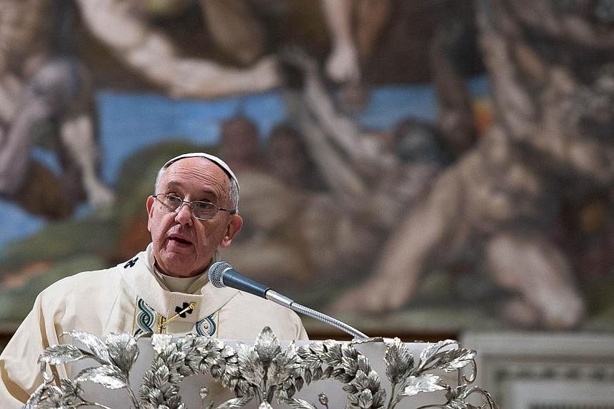 Pope Francis delivering a speech during a baptizing ceremony in the Sistine Chapel at the Vatican on Jan 11, 2015.&nbsp;Pope Francis on Monday slammed "deviant forms of religion" following deadly attacks by militants in France last week that left 17 