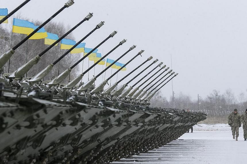 The writer says India is the ideal Asian country to send a peacekeeping mission to the conflict zone in south-east Ukraine, where the Ukrainian military (above) is battling pro-Russian groups.