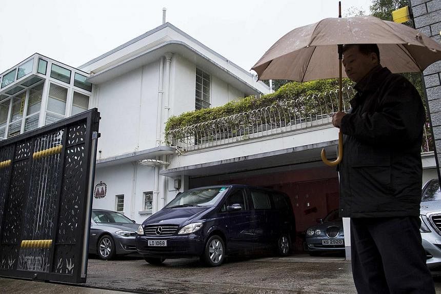 A security standing guard outside the house of Hong Kong media tycoon Jimmy Lai in Hong Kong on Jan 12, 2015. The home and former offices of Mr Lai, an outspoken critic of Beijing who also played a prominent role in large pro-democracy protests last 