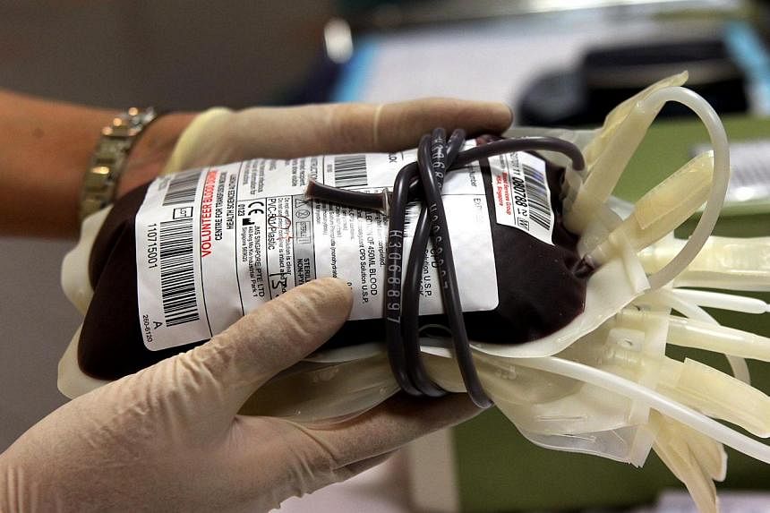 A five-year-old girl in China contracted HIV through a blood transfusion, state media reported, the latest case to shine a light on an issue that has long bedevilled the country. -- PHOTO: ST FILE